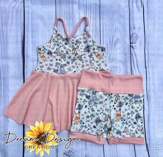 2t Crisscross peplum & biker set