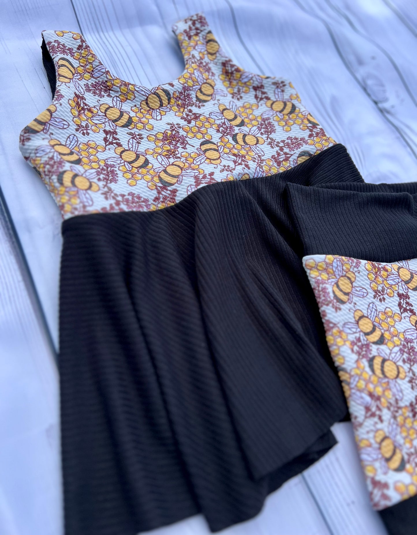 3T Sleeveless peplum & biker set
