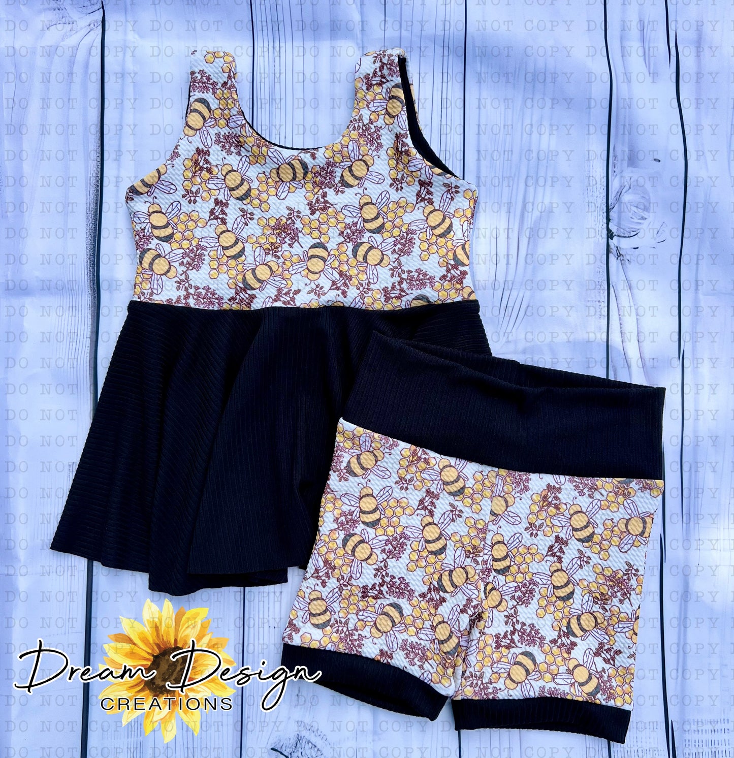 3T Sleeveless peplum & biker set
